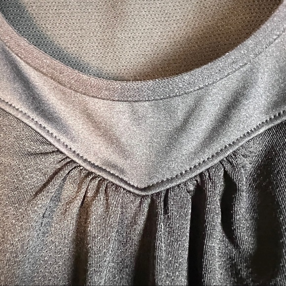 ATHLETA Black Top with built in bra. Floral side panels open underarms. Size M - Picture 8 of 8